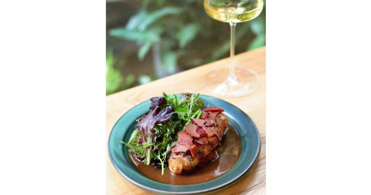 Seafood sausage with lobster jus